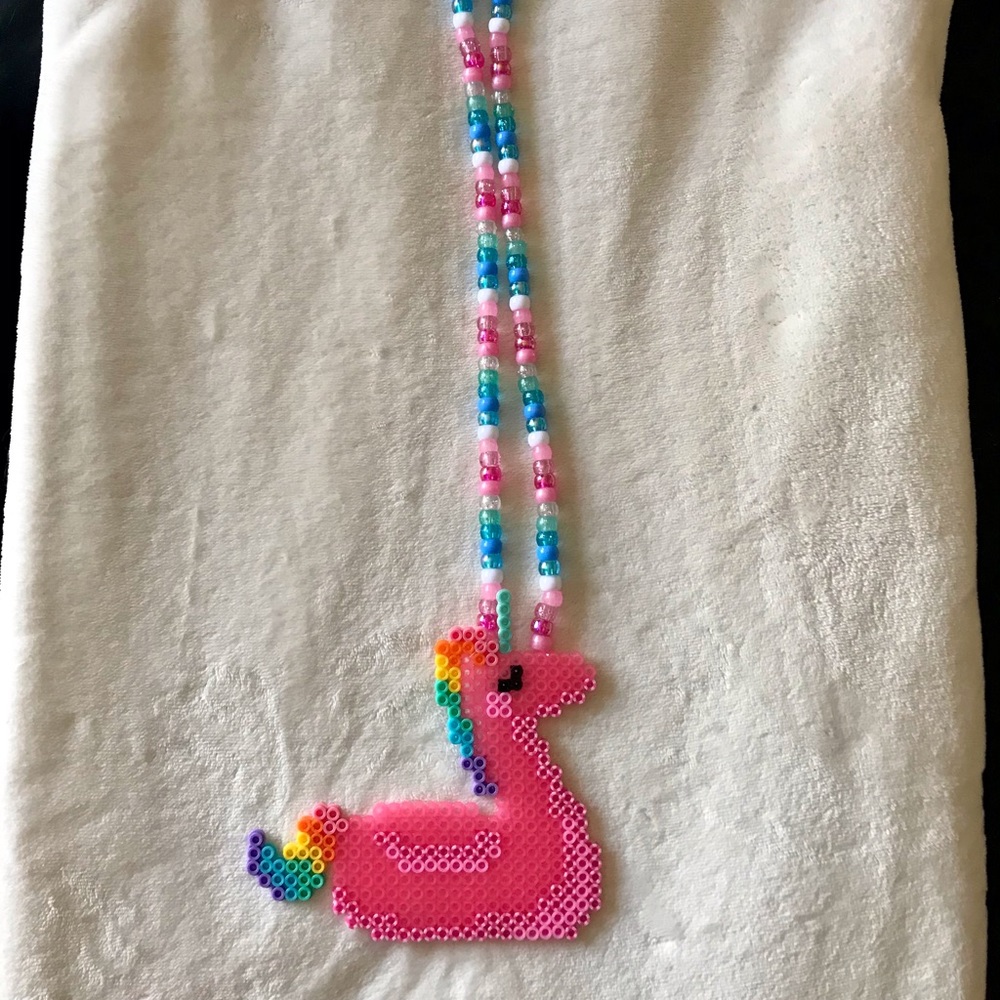 Unicorn pendant pool Floatie EDM Kandi necklace— party glow in dark black light